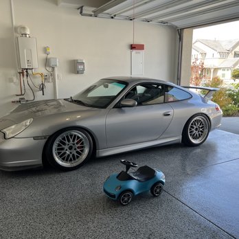Epoxy Floors - a car and a scooter in a garage - Flooring Near Me - Santa Clarita, California Epoxy Floors - a car and a scooter in a garage - Flooring Near Me - Santa Clarita, California