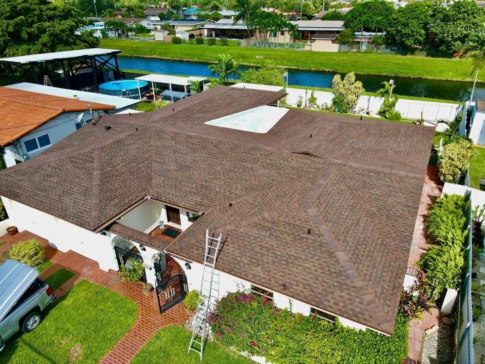 Slide of TJ Platinum Roofing