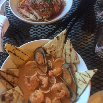 District 7 Grill - the ciopino (bottom) & the chicken Parmesan (top) with linguine & marinara. I recommend to add pasta instead of the chips to your dish - Breakfast & Brunch Near Me - Houston, Texas