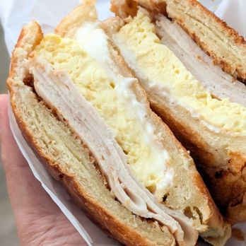 Lloyd's Donut Kitchen - Turkey breakfast croissant with cheese and egg, I like how evenly spread the fillings are - Donuts Near Me - Fremont, California Lloyd's Donut Kitchen - Turkey breakfast croissant with cheese and egg, I like how evenly spread the fillings are - Donuts Near Me - Fremont, California