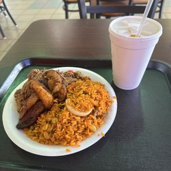 Cajio's Cuban Cuisine - Shredded beef, plaintains, and yellow rice with mango drink