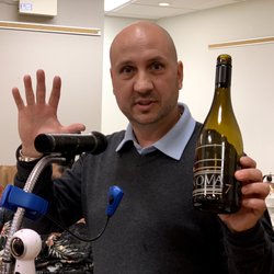 Baseline Wine & Spirits - Ryan presenting at the Lions Wine and Cheese Tasting Event.