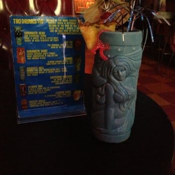 Otto's Shrunken Head - Shrunken Head in a mermaid glass! - Tiki Bars Near Me - New York, New York Otto's Shrunken Head - Shrunken Head in a mermaid glass! - Tiki Bars Near Me - New York, New York