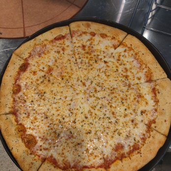 The Village Pizzeria - This is the 20 in (giant) classic cheese pizza. You can add any topping you want. - Pizza Near Me - Waco, Texas The Village Pizzeria - This is the 20 in (giant) classic cheese pizza. You can add any topping you want. - Pizza Near Me - Waco, Texas