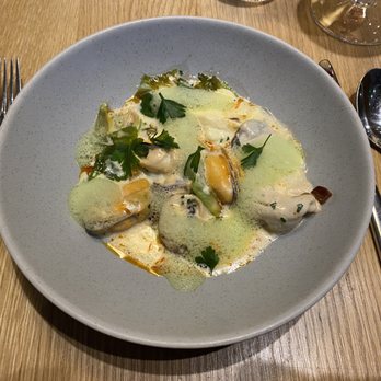 Twelve - Mussels with escarole, chorizo, and garlic chive - New American Near Me - Portland, Maine