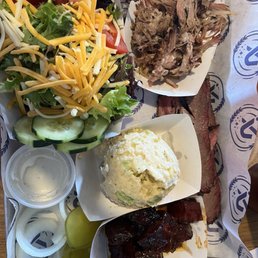 1/2 lb. Pulled Pork, 1/2 lb. Brisket and 1/2 lb. Burnt Ends (3 meat combo with 2 sides)