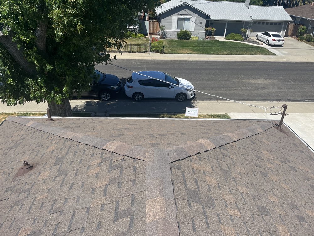 Slide of Fredy's Roofing