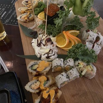 Sushi Zen - Multiple sushi rolls served on a platter. - Sushi Bars Near Me - Brighton, Michigan
