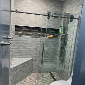 Rodscape - a bathroom with a glass shower door - Landscaping Near Me - San Francisco, California Rodscape - a bathroom with a glass shower door - Landscaping Near Me - San Francisco, California