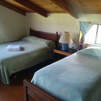 Holo Holo In - Clean rooms w/ comfortable beds. - Hostels Near Me Holo Holo In - Clean rooms w/ comfortable beds. - Hostels Near Me
