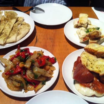 The Workers' Food Room - Capsicum salad with golden sultanas, wood fired pita bread, halloumi with sweet potato, and house made hummus. - Cafes Near Me - Melbourne, VIC The Workers' Food Room - Capsicum salad with golden sultanas, wood fired pita bread, halloumi with sweet potato, and house made hummus. - Cafes Near Me - Melbourne, VIC