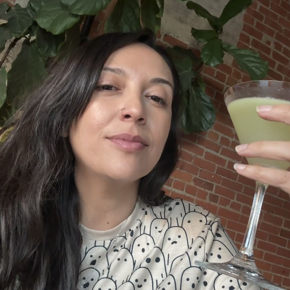 Me drinking the best martini! Me drinking the best martini!