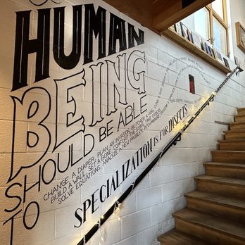 Wolverine Farm Publick House - LOVE the wall art and humanitarian message. - Venues & Event Spaces Near Me - Fort Collins, Colorado
