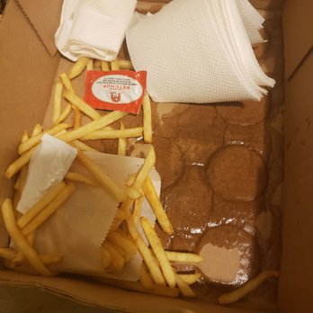 Key Burger - The box the food came in and the fries that fell through the bottom of the bag. - Burgers Near Me - Pacoima, California Key Burger - The box the food came in and the fries that fell through the bottom of the bag. - Burgers Near Me - Pacoima, California