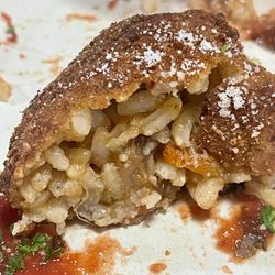 Fried ossobuco rice ball appetizer.