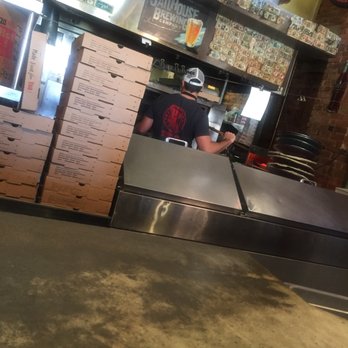 Slices Pizzeria - Guy flips your pizza right in front of you. Pretty cool vs other places - Pizza Near Me - Griffin, Georgia Slices Pizzeria - Guy flips your pizza right in front of you. Pretty cool vs other places - Pizza Near Me - Griffin, Georgia