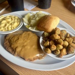 Garden Gate Cafe - Country fried steak with brown gravy, macaroni and cheese, cabbage, and fried okra with a roll