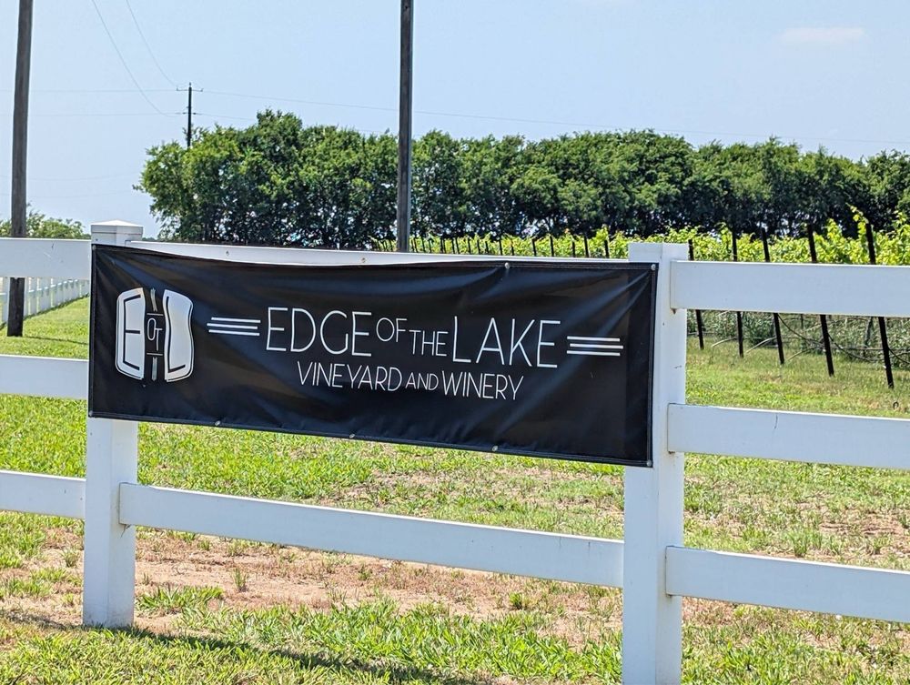 Edge Of The Lake Vineyards Logo