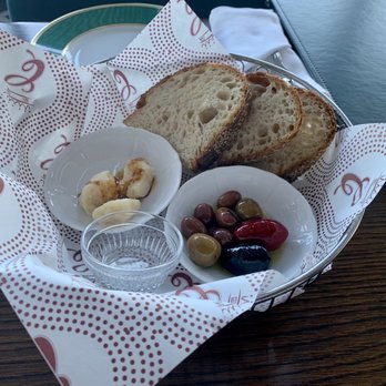 Contessa - Boston - Complimentary bread, Parmesan with balsamic, and olives - Italian Near Me - Boston, Massachusetts Contessa - Boston - Complimentary bread, Parmesan with balsamic, and olives - Italian Near Me - Boston, Massachusetts