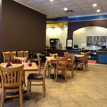 Grand Garden - a restaurant with tables and chairs - Chinese Near Me - Humble, Texas Grand Garden - a restaurant with tables and chairs - Chinese Near Me - Humble, Texas
