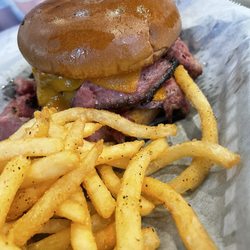 Jimmy P's Butcher Shop - Bonita Springs - Hot pastrami with cheddar on a brioche bun with fries