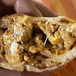 MadCity Drinks & Treats - Close up of the chorizo and egg burrito