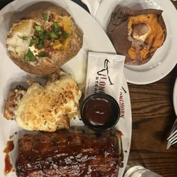 Combo w/1/2 slab of ribs w/chicken w/parmesan cheese, stuffed baked potato & sweet potato w/brown sugar cinnamon & butter Combo w/1/2 slab of ribs w/chicken w/parmesan cheese, stuffed baked potato & sweet potato w/brown sugar cinnamon & butter