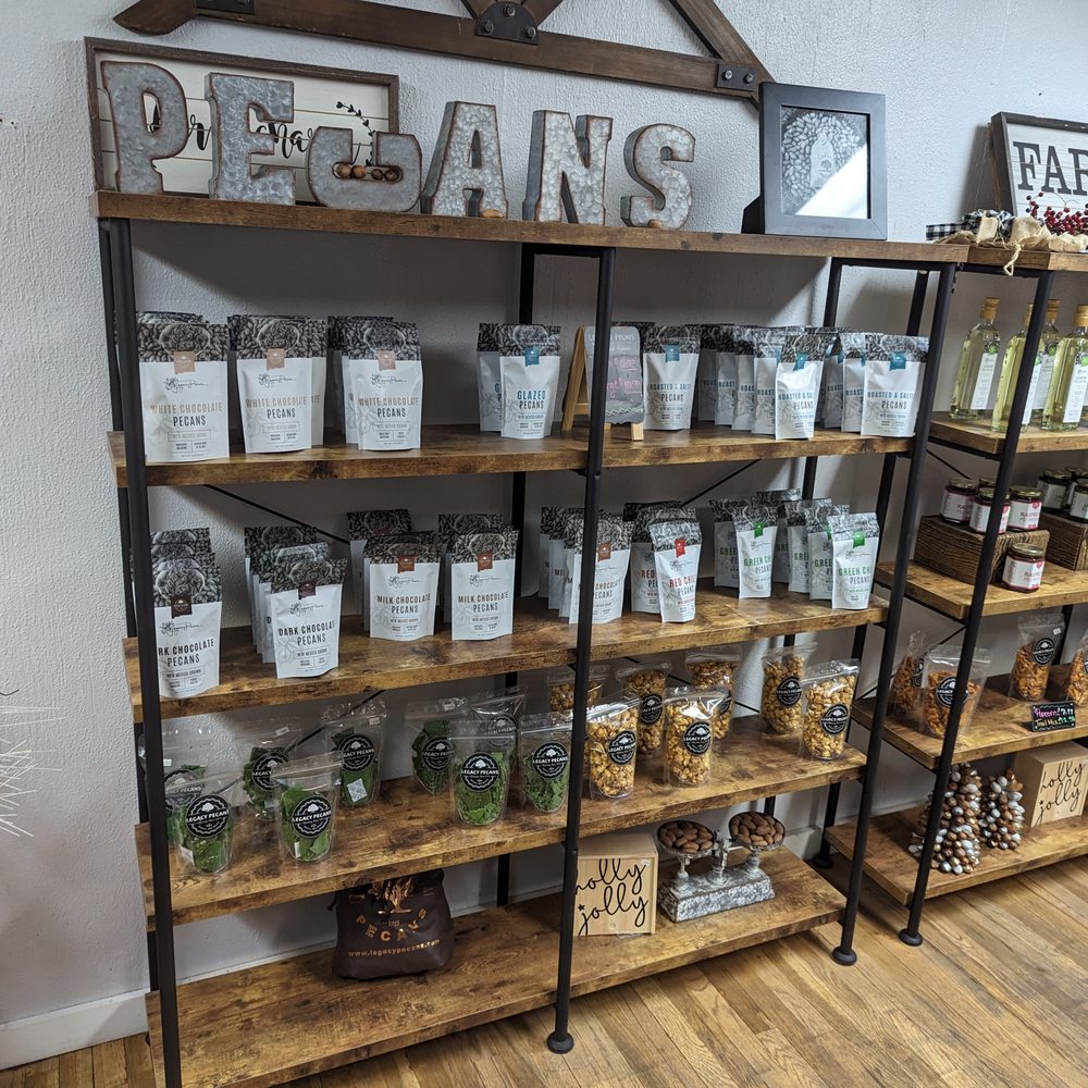 Legacy Pecans - a display of products in a store - Specialty Food Near Me - Mesilla, New Mexico Legacy Pecans - a display of products in a store - Specialty Food Near Me - Mesilla, New Mexico