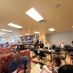 people eating in a restaurant people eating in a restaurant