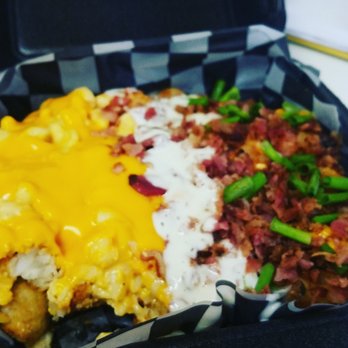 Doghouse - This is the tater sampler. Big portion uncooked taters :( - Hot Dogs Near Me - Orlando, Florida Doghouse - This is the tater sampler. Big portion uncooked taters :( - Hot Dogs Near Me - Orlando, Florida