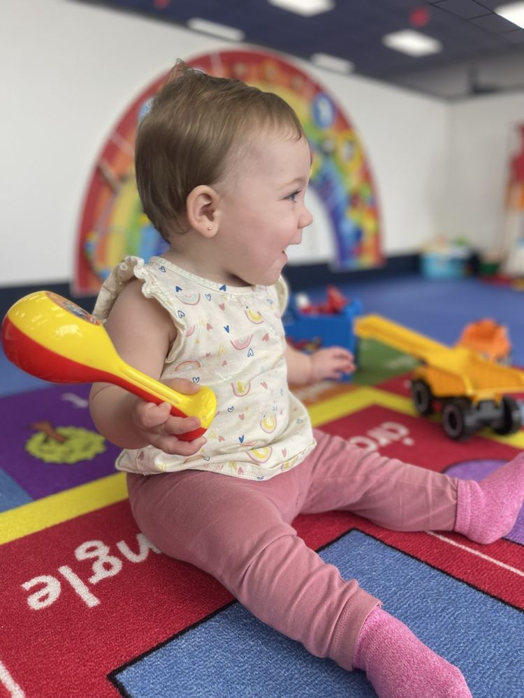 We Rock The Spectrum - Coral Springs Logo