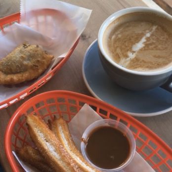 Chalos - Cinnamon (Add-on) to Churros and #1. Carne Empanada (fried) and and Almond milk Latte - Coffee & Tea Near Me - San Francisco, California