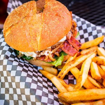 Grilldudes - Our Dudes' Burger topped with cheddar and bacon, guacamole, onions, lettuce, tomatoes and pickles dressed with our tasty Dudes' sauce. - Food Trucks Near Me - Toronto, Ontario Grilldudes - Our Dudes' Burger topped with cheddar and bacon, guacamole, onions, lettuce, tomatoes and pickles dressed with our tasty Dudes' sauce. - Food Trucks Near Me - Toronto, Ontario
