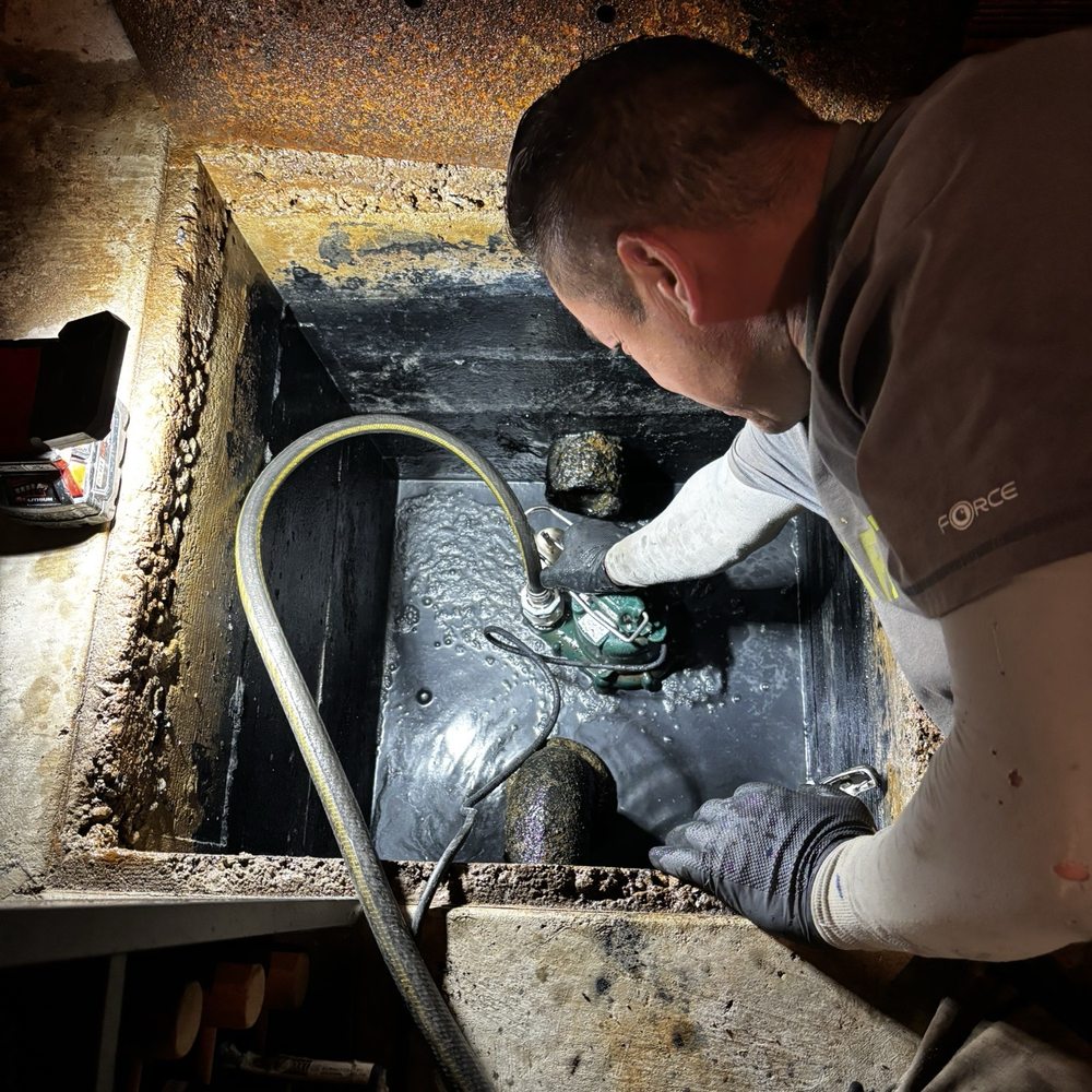 TGI Builders - Vicente draining water, sand, rust and crud from the sump basin. - General Contractors Near Me TGI Builders - Vicente draining water, sand, rust and crud from the sump basin. - General Contractors Near Me