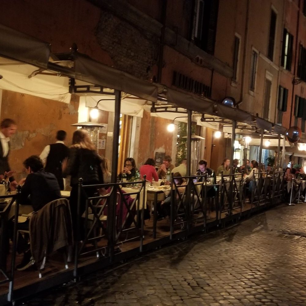 Plenty of covered outside seating in addition to a cozy dining room. Plenty of covered outside seating in addition to a cozy dining room.