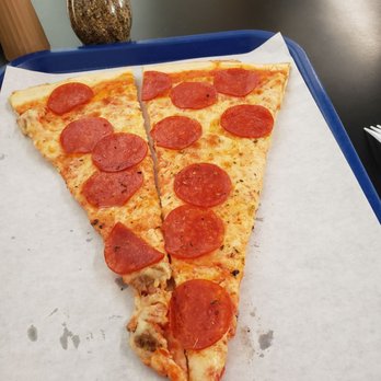 Primos Chicago Pizza - Slice of pizza - Pizza Near Me - Chicago, Illinois