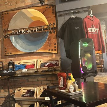 Sunrift Beer Company - Merch wall - Brewpubs Near Me - Kalispell, Montana Sunrift Beer Company - Merch wall - Brewpubs Near Me - Kalispell, Montana