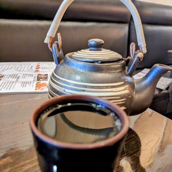 Sushi 9 - a teapot and a cup of coffee on a table - Sushi Bars Near Me - Katy, Texas