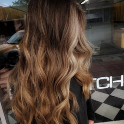 TMW Styling - Balayage with a prominent blonde "money piece".