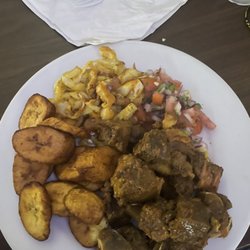 Phil's Sports Bar & Grill - Nyama Choma (it's a lil dry) with cabbage and plantain (not ripe enough)