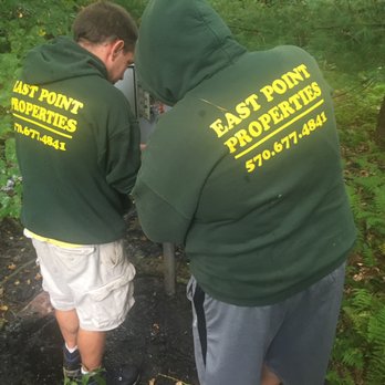 East Point Properties - two men in green hoodies - Property Management Near Me East Point Properties - two men in green hoodies - Property Management Near Me