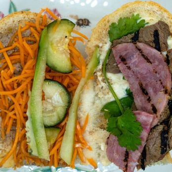 Pho Vital - Grilled Beef Bánh Mì 烤牛肉麵包: $12; $13.07 with tax. Half of sandwich shown opened. Those sear marks look fake. - Vietnamese Near Me - LONG ISLAND CITY, New York Pho Vital - Grilled Beef Bánh Mì 烤牛肉麵包: $12; $13.07 with tax. Half of sandwich shown opened. Those sear marks look fake. - Vietnamese Near Me - LONG ISLAND CITY, New York