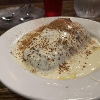 M Mogger's Restaurant & Pub - Bread pudding view #1. It was served hot. Cinnamon powder was perfect. - American Near Me - Terre Haute, Indiana M Mogger's Restaurant & Pub - Bread pudding view #1. It was served hot. Cinnamon powder was perfect. - American Near Me - Terre Haute, Indiana