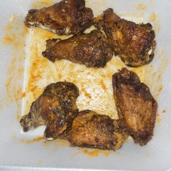 Flanigan's - Davie Tower Shops - Overcooked, dry and burnt but tossed in sauce - Seafood Near Me - Davie, Florida