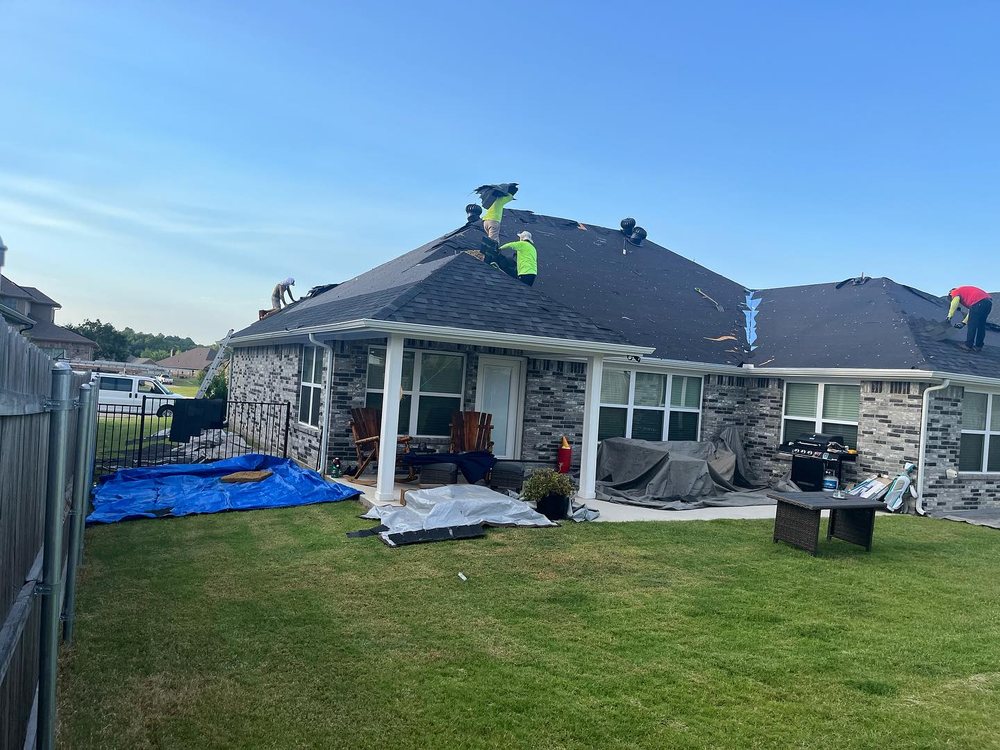 Slide of ER Roofing & Reconstruction