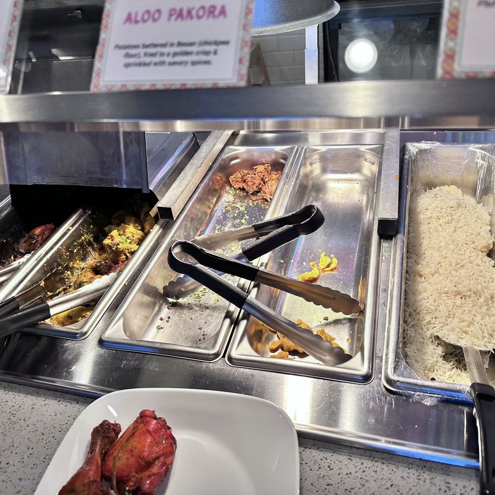 Naan & Curry - The empty trays with a few extremely hard pieces of meat. - Indian Near Me - Las Vegas, Nevada Naan & Curry - The empty trays with a few extremely hard pieces of meat. - Indian Near Me - Las Vegas, Nevada