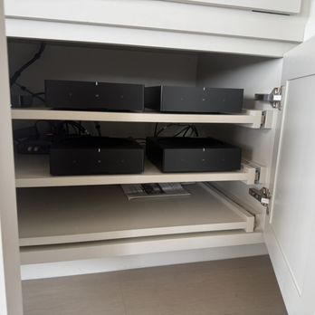 Wire Genie - Multiple Sonos Amps in a media cabinet, each powering a different room with built-in speakers. - Home Theatre Installation Near Me Wire Genie - Multiple Sonos Amps in a media cabinet, each powering a different room with built-in speakers. - Home Theatre Installation Near Me