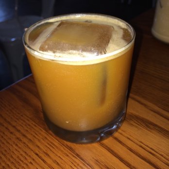 Horizon Line Coffee - The Vegan it has ginger beer served at table over big ice cube - Coffee Roasteries Near Me - Des Moines, Iowa Horizon Line Coffee - The Vegan it has ginger beer served at table over big ice cube - Coffee Roasteries Near Me - Des Moines, Iowa