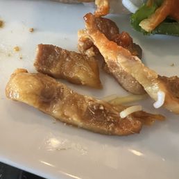 The grilled pork was nothing but gristle and fat The grilled pork was nothing but gristle and fat