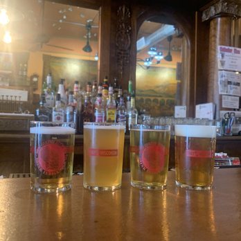Puempel's Olde Tavern - Sampler and got a take home pint glass! - Bars Near Me - New Glarus, Wisconsin